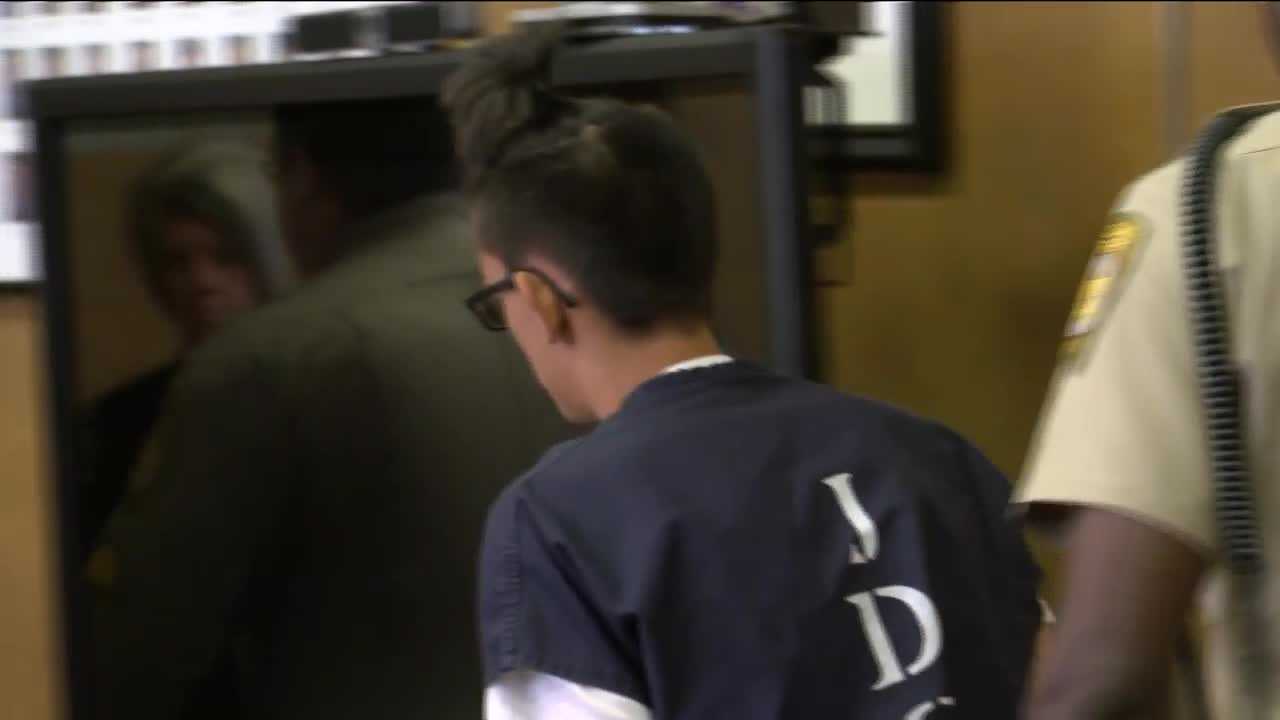 Judge orders teen held in Clovis library killings