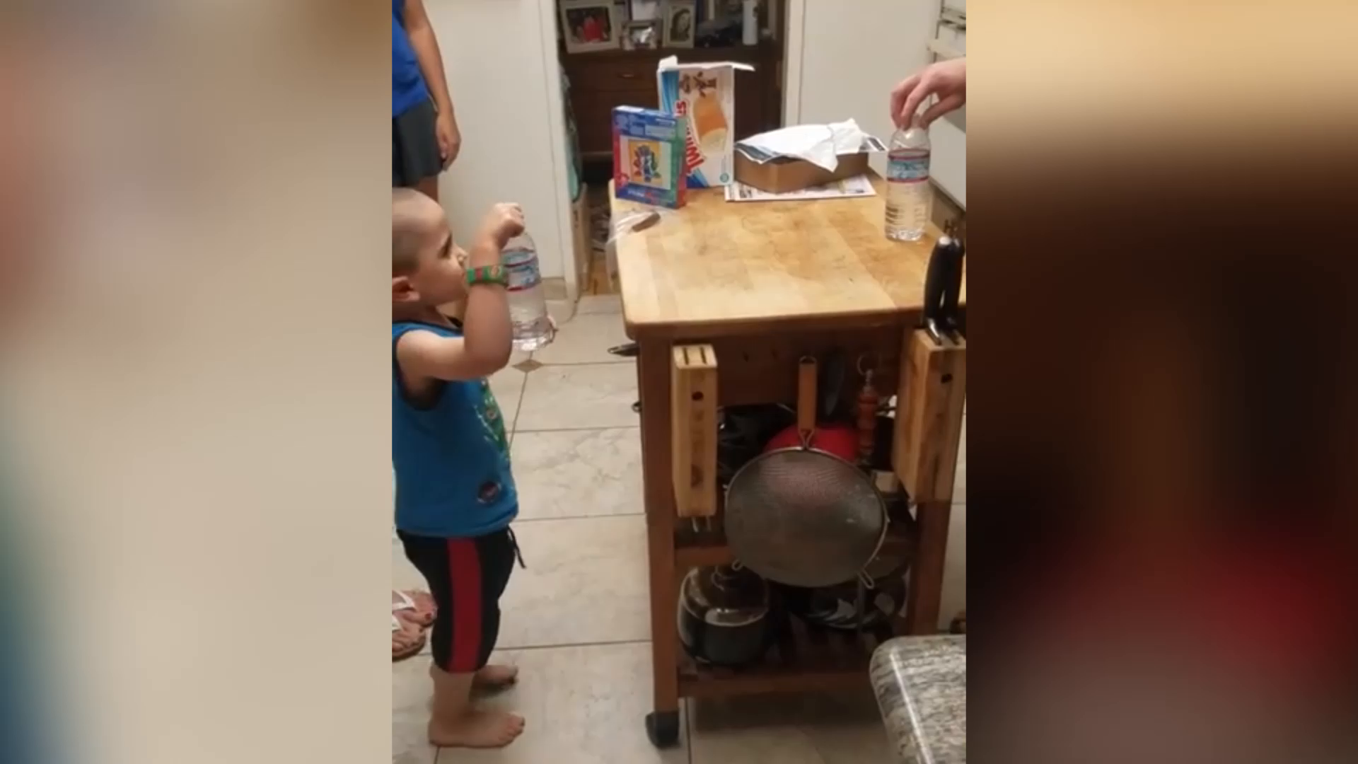 Watch this 3-year-old's epic bottle flipping skills