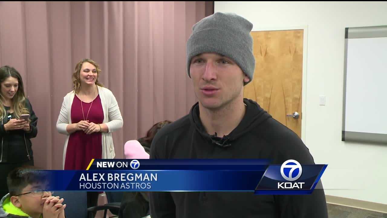 Hometown hero hands out iPads to students with Autism