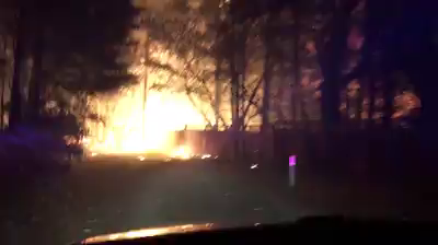 Up-close video captures deputy's drive through raging wildfire