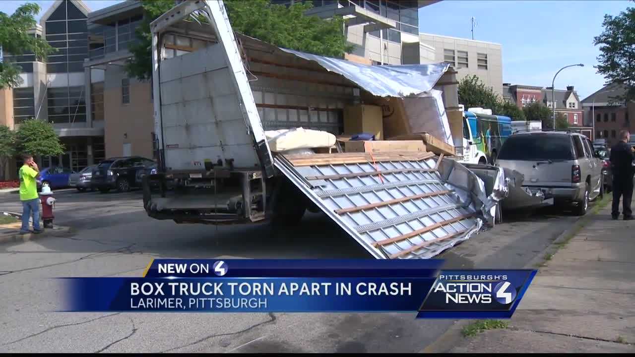 Box truck torn apart while driving under overpass in Larimer