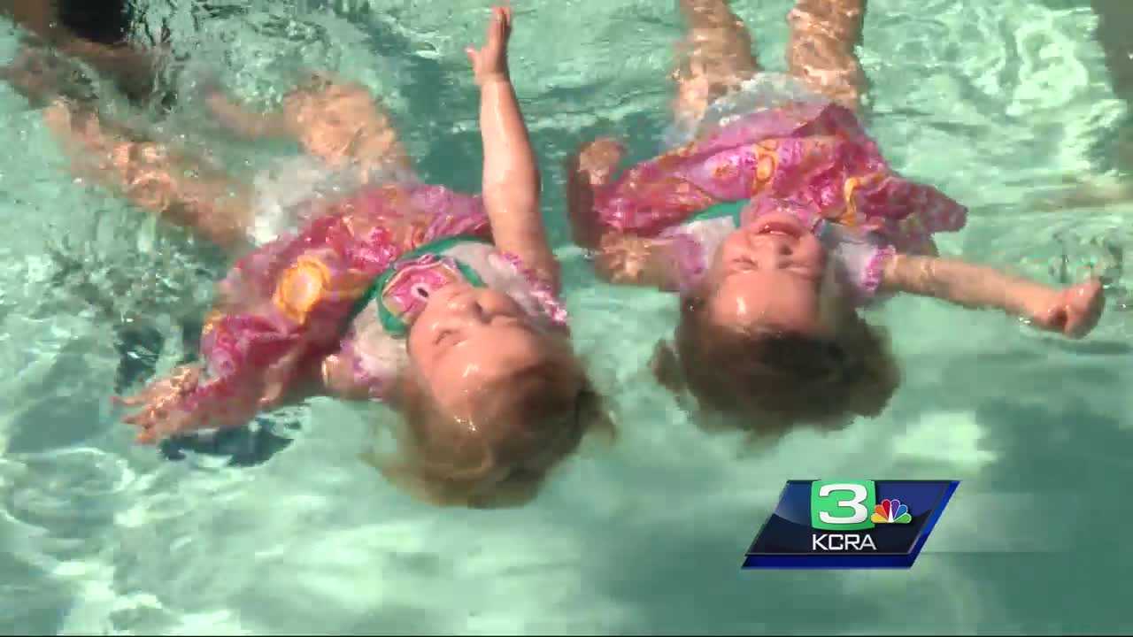 Infants learn swim survival skills at Sacramento-area pool