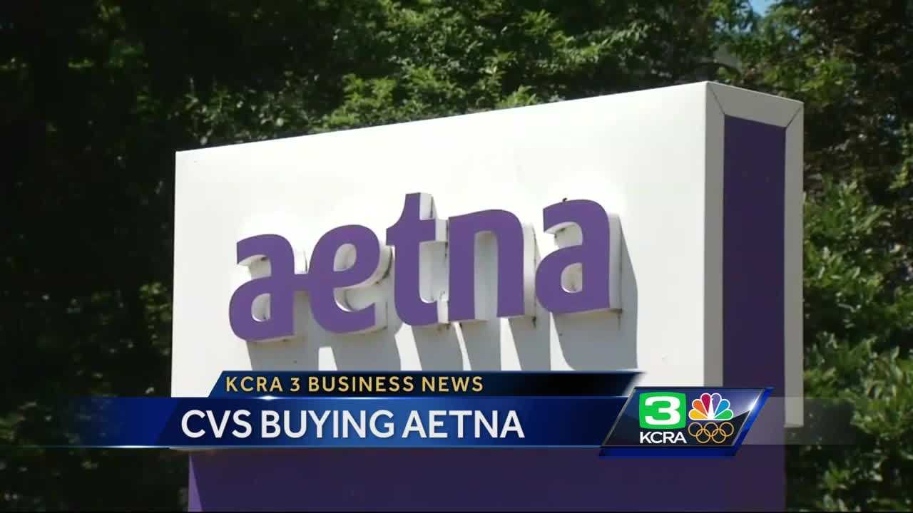 Business News: CVS to buy Aetna for $69 billion