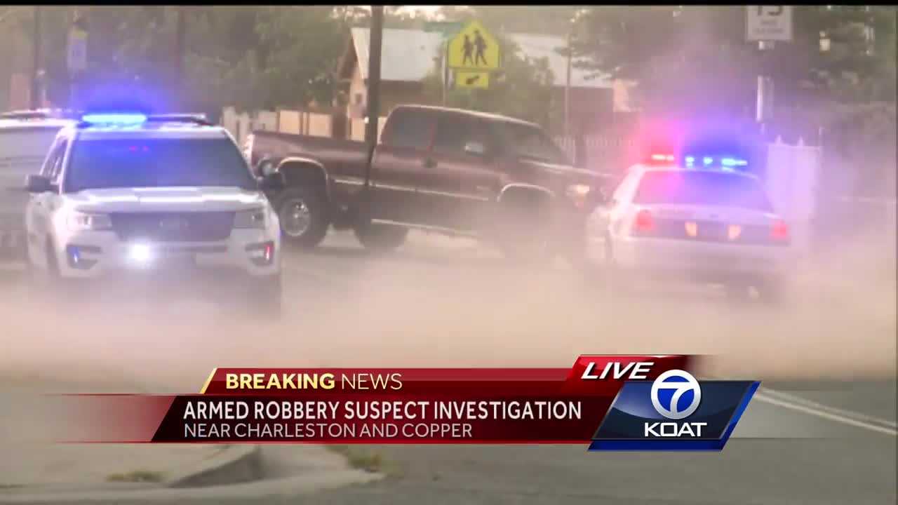 Man in custody after robbing Pizza 9 at gunpoint