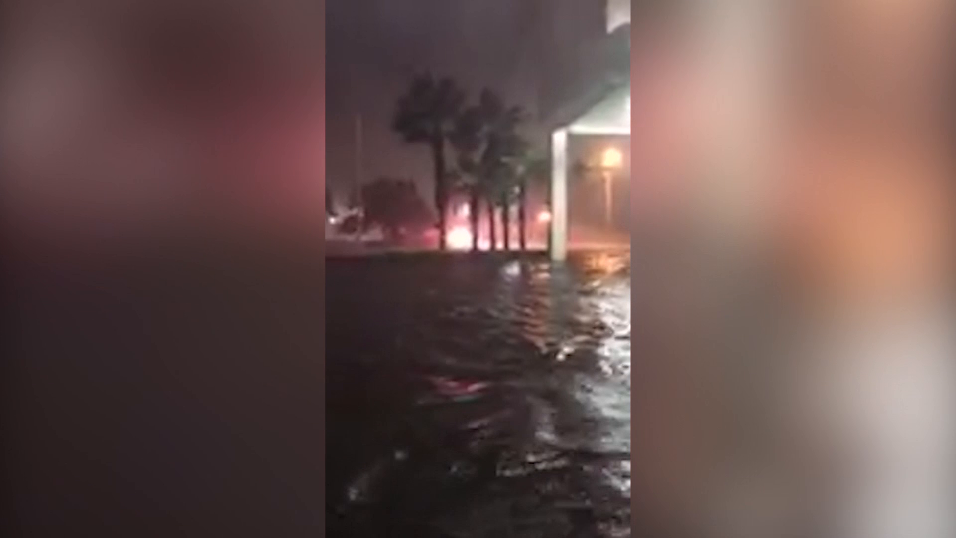 Firefighters wade through floodwater as Nate hits Gulf Coast