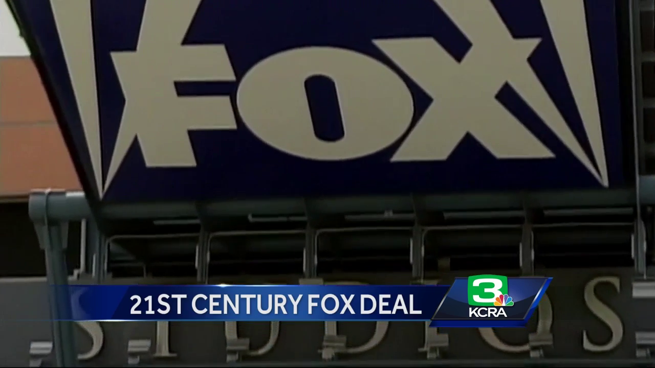 Business News: Comcast out Disney in on Fox bid