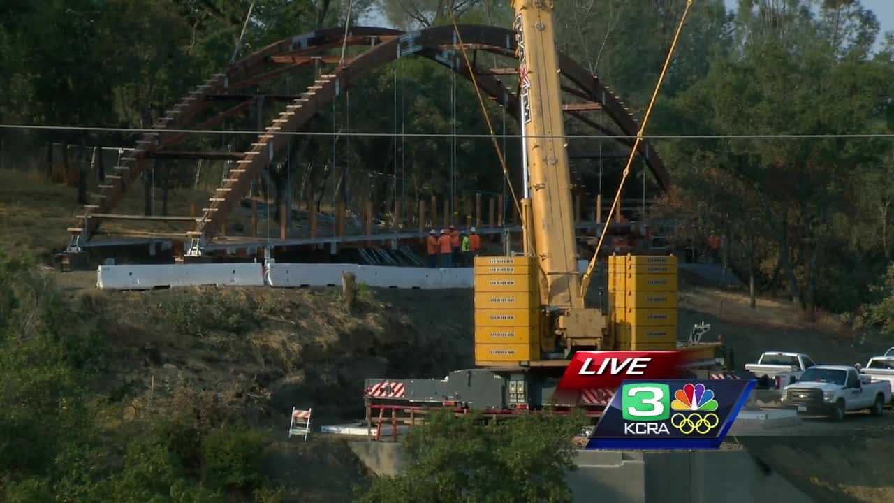 Giant crane to lift 80,000 pound bridge along Johnny Cash Trail