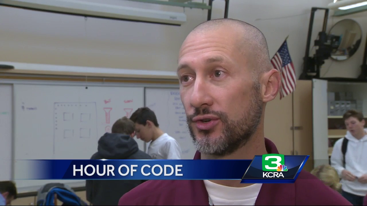 High School students learn to code computers, apps & robots
