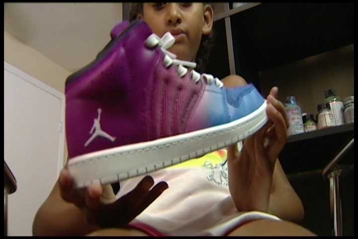 Business owner uses custom shoes to give community skills