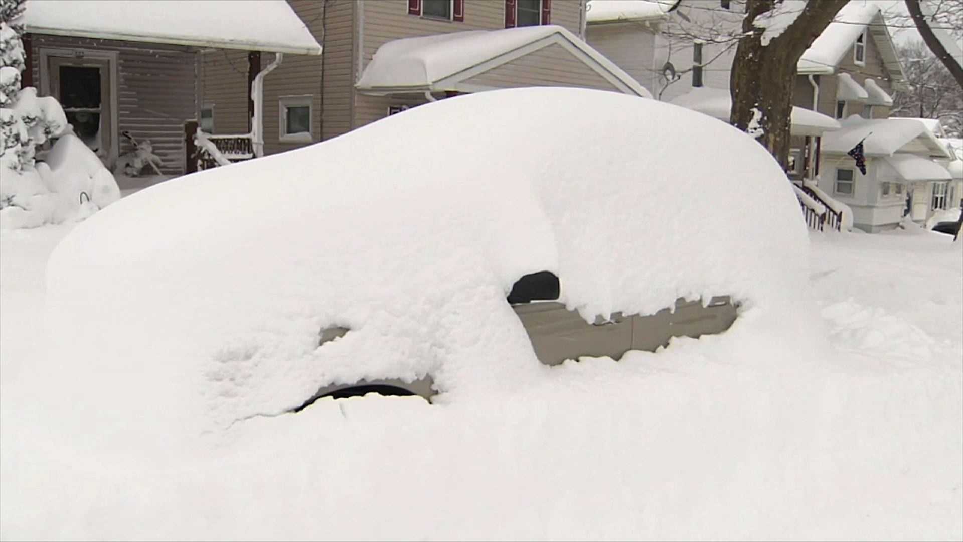Erie smashes snowfall record with flakes still falling