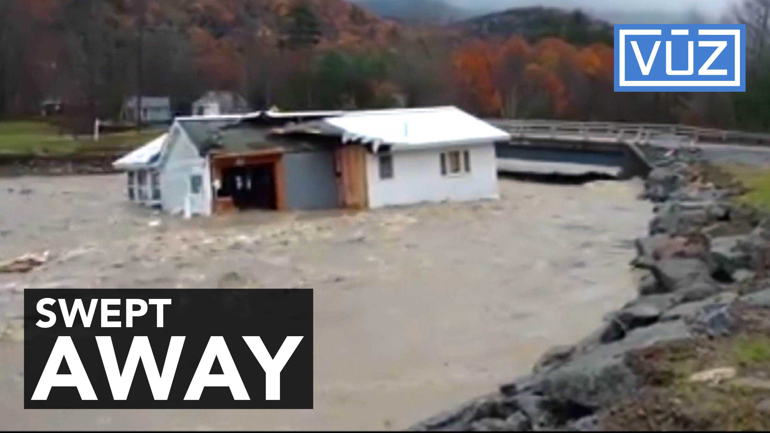 Family's home swept downriver, crushed