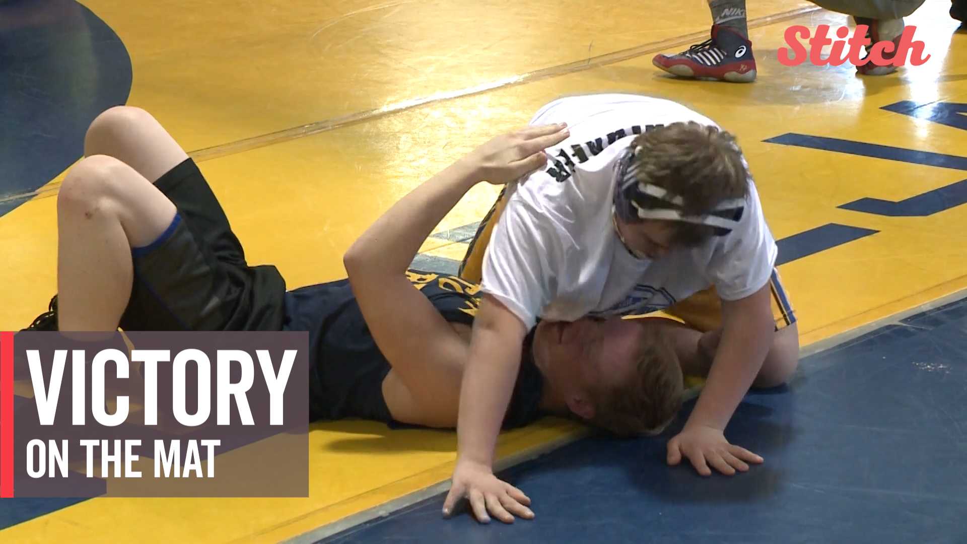 Student with Down syndrome achieves first wrestling victory