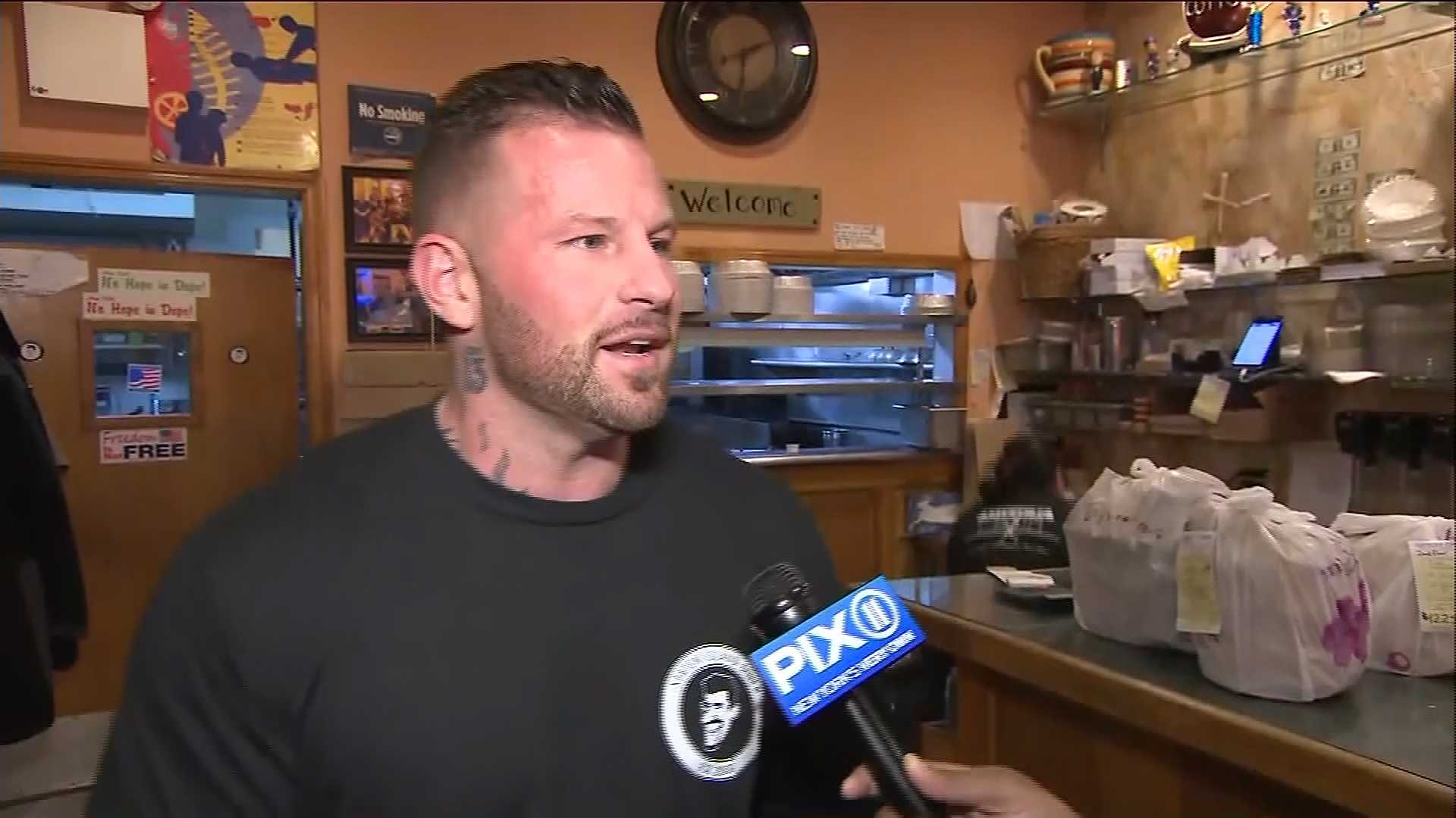 Caught on camera: Good Samaritan saves choking police officer