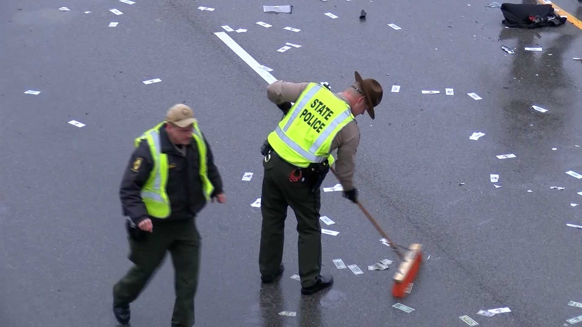 Illinois highway littered with cash after car accident