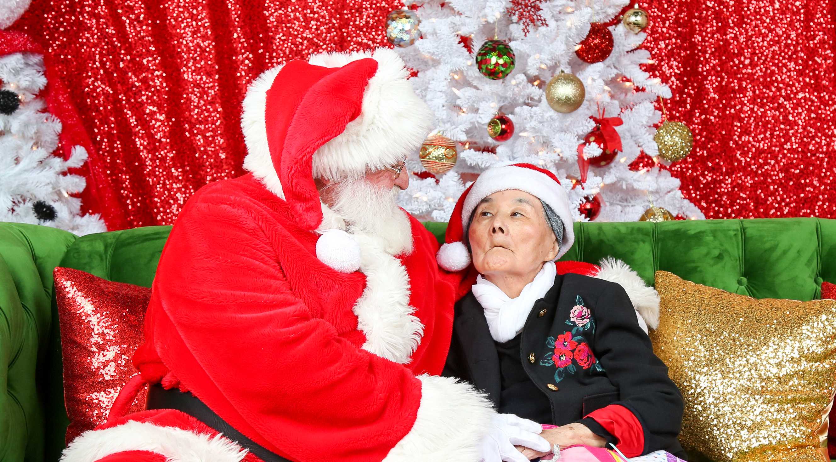 Santa Claus brings gift of happy memories to elderly woman with dementia